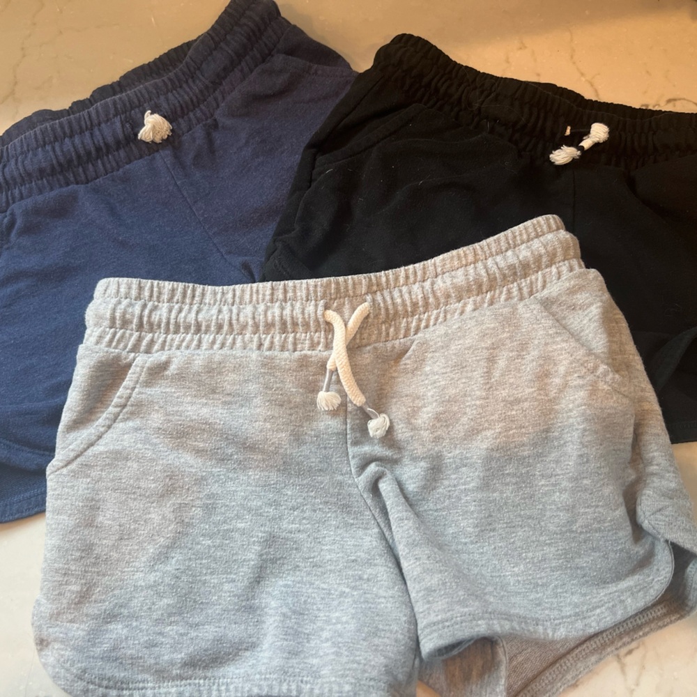 3 pairs of Cat and Jack shorts. Size 8.